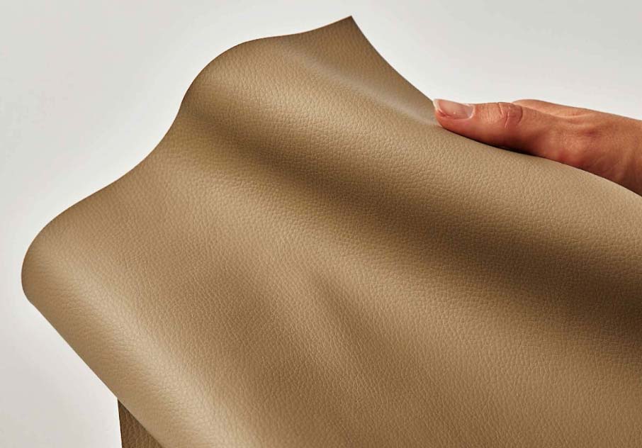 Hand holding material swatch