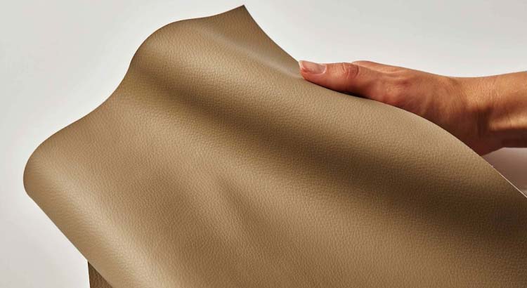 Hand holding material swatch