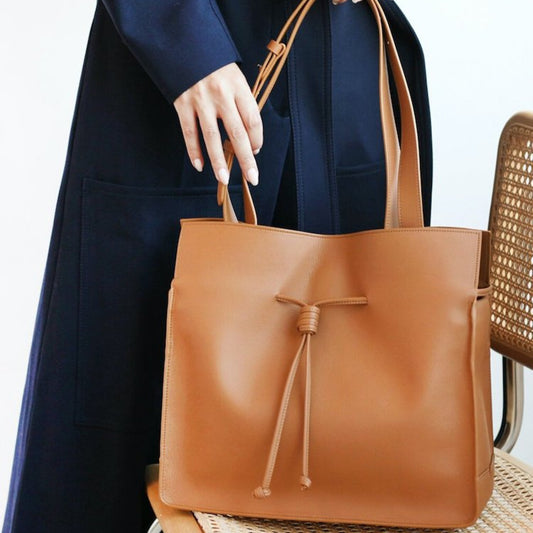 The Good Trade: 9 Vegan Leather Handbags To Tote In 2023