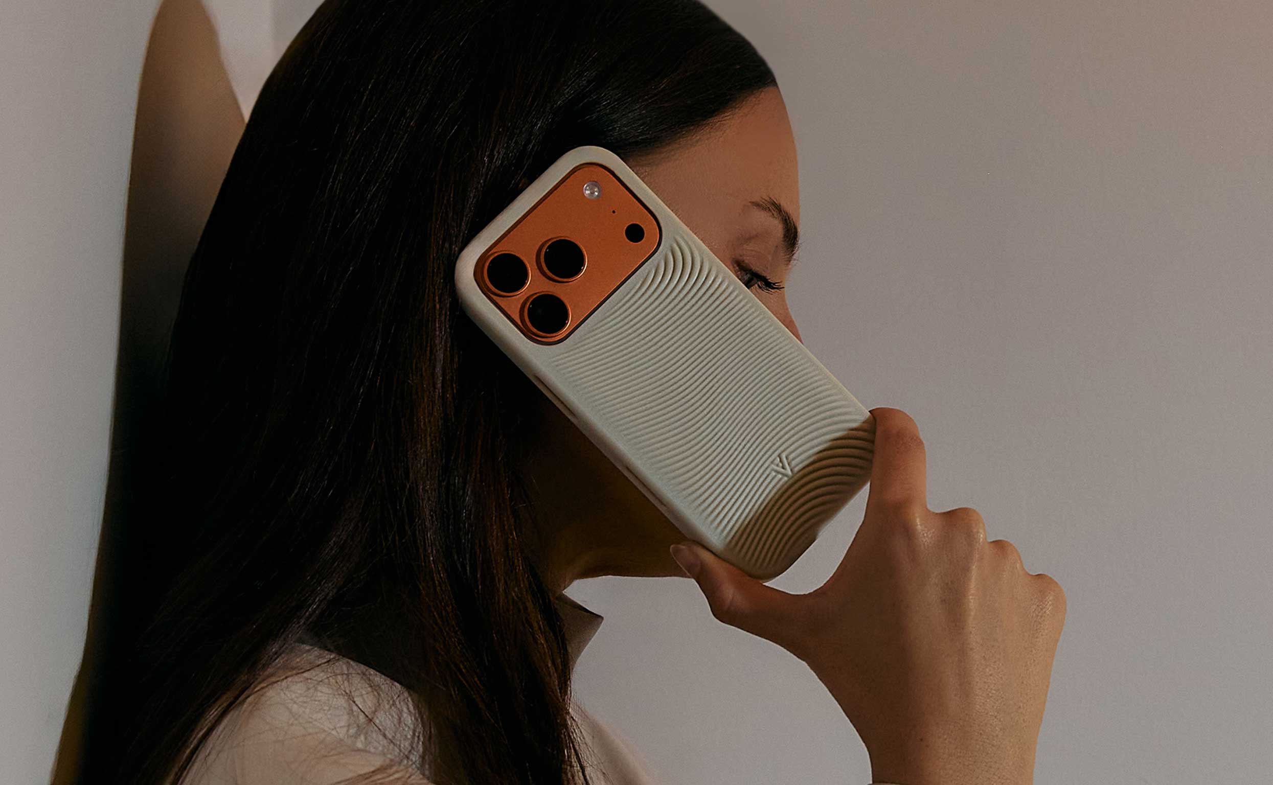 von Holznausen chemist in a lab coat holding a shoe made of Liquidplant in the laboratory