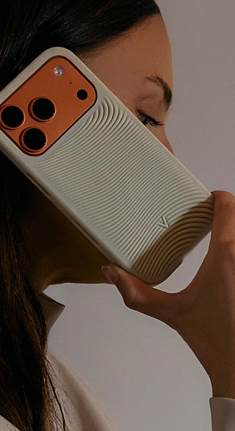 von Holznausen chemist in a lab coat holding a shoe made of Liquidplant in the laboratory