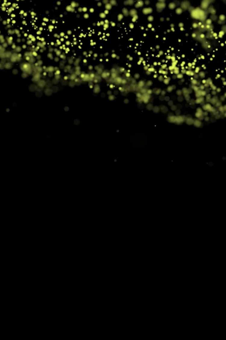 Slide background: Glowing green bubbles floating on the surface of an unlit liquid.